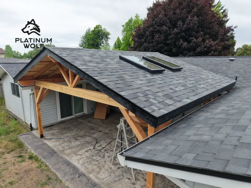 Covered patio roofing upgrade with skylight — photo 5
